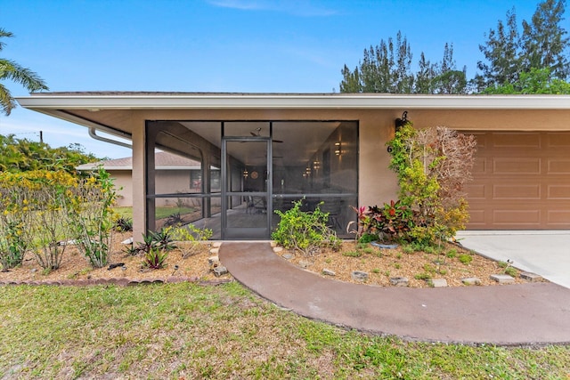 6028 140th Ave N, The Acreage, FL 33412 - view of exterior entry with stucco siding
