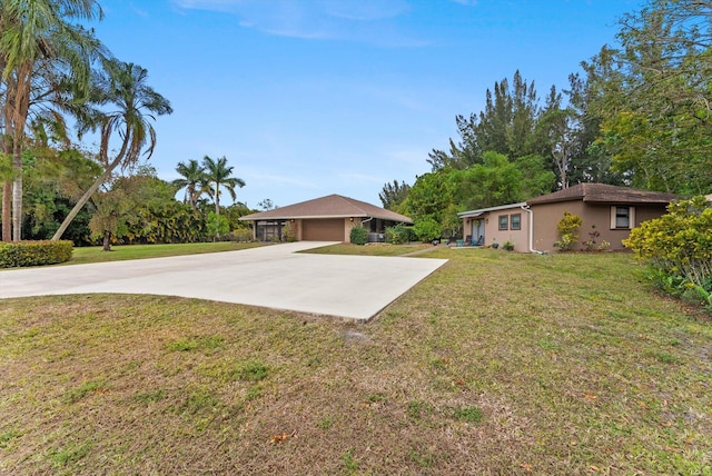 6028 140th Ave N, The Acreage, FL 33412 - view of grassy yard with driveway