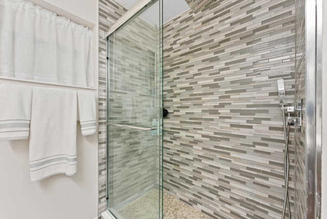 bathroom featuring a stall shower