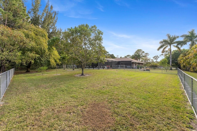 view of yard with a fenced backyard