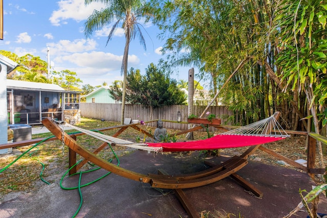 1894 NW Britt Rd, Stuart, FL 34994 - fenced backyard with a sunroom and central AC