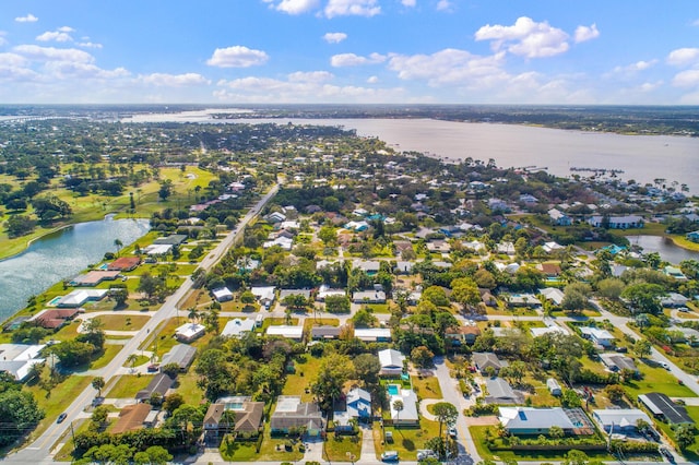 1894 NW Britt Rd, Stuart, FL 34994 - aerial view of property's location with a nearby body of water and nearby suburban area
