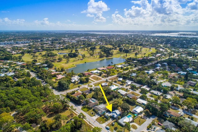 1894 NW Britt Rd, Stuart, FL 34994 - aerial overview of property's location with a nearby body of water and nearby suburban area