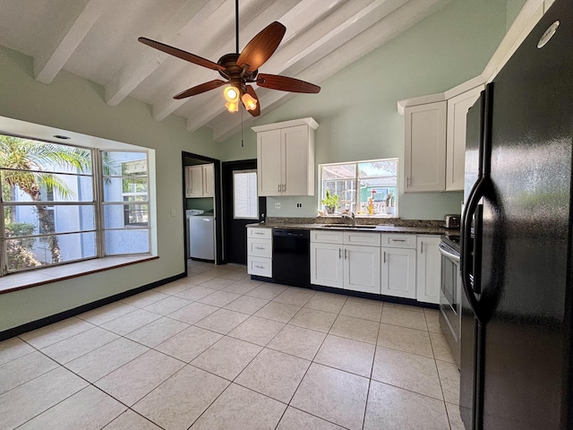 1894 NW Britt Rd, Stuart, FL 34994 - kitchen with black appliances, light tile patterned floors, a sink, beam ceiling, and dark countertops