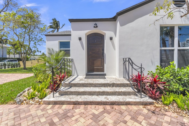 4015 Washington Rd, West Palm Beach, FL 33405 - doorway to property featuring stucco siding