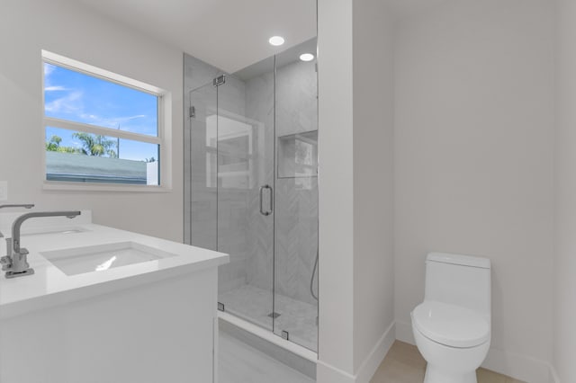 4015 Washington Rd, West Palm Beach, FL 33405 - bathroom featuring baseboards, recessed lighting, toilet, a shower stall, and a sink