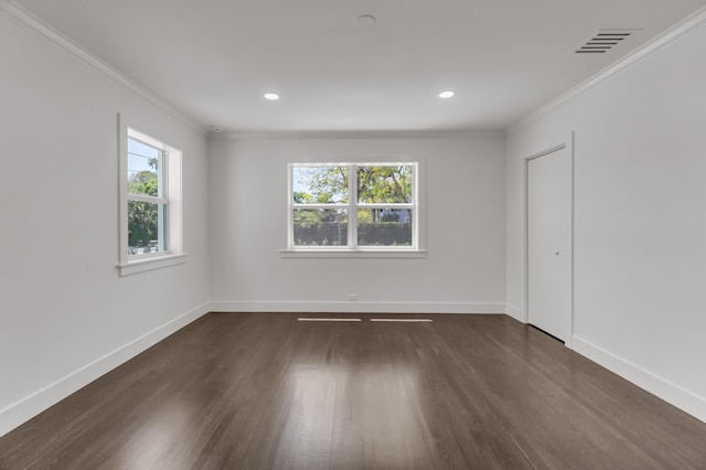 4015 Washington Rd, West Palm Beach, FL 33405 - unfurnished room with visible vents, plenty of natural light, and dark wood finished floors