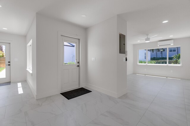 4015 Washington Rd, West Palm Beach, FL 33405 - entrance foyer with an AC wall unit, baseboards, recessed lighting, and electric panel