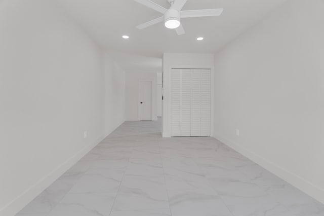 4015 Washington Rd, West Palm Beach, FL 33405 - empty room with marble finish floor, baseboards, and recessed lighting