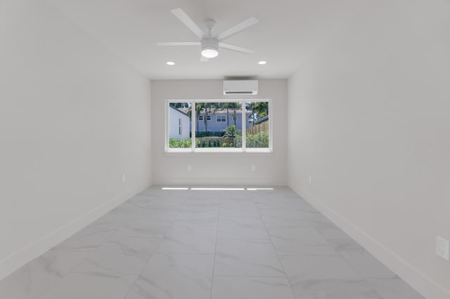 4015 Washington Rd, West Palm Beach, FL 33405 - spare room featuring a ceiling fan, recessed lighting, a wall mounted AC, marble finish floor, and baseboards