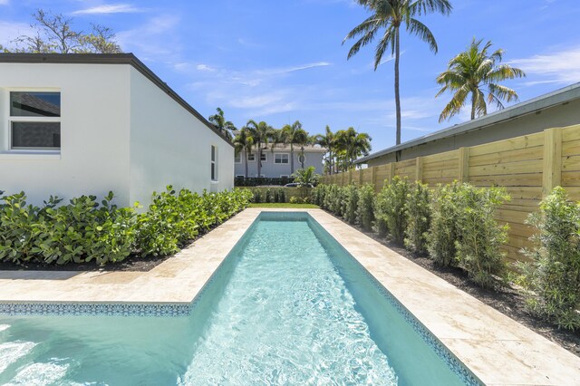 4015 Washington Rd, West Palm Beach, FL 33405 - view of pool with a fenced backyard and a fenced in pool