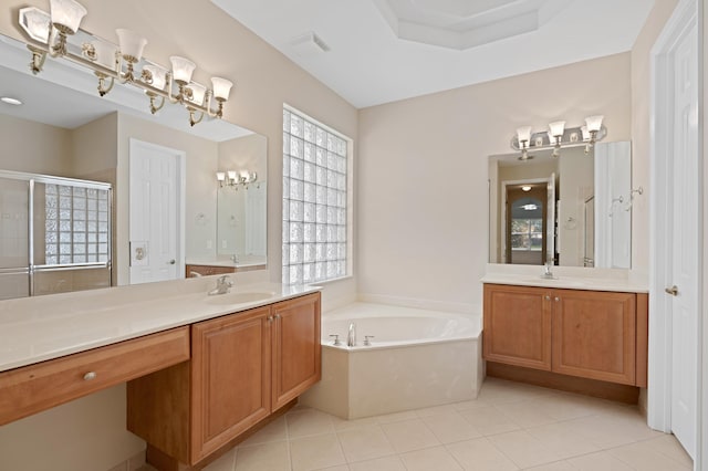 full bath with a sink, a garden tub, a shower stall, tile patterned flooring, and visible vents
