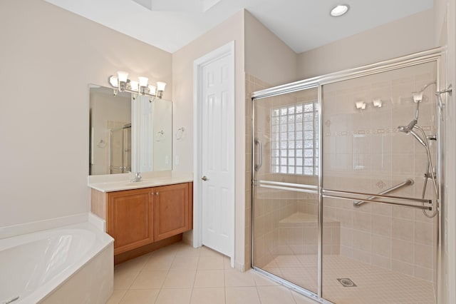 bathroom featuring a shower stall, tile patterned floors, vanity, and a garden tub