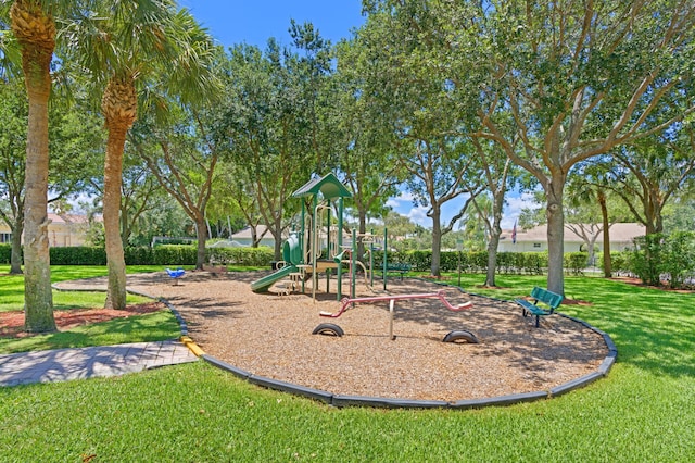 community jungle gym with a yard