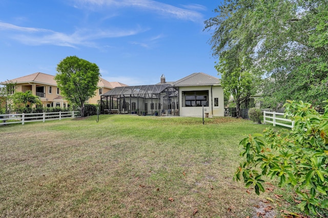 view of yard with a lanai