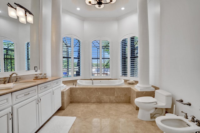 9210 Equus Cir, Boynton Beach, FL 33472 - bathroom with a bidet, healthy amount of natural light, a garden tub, vanity, and ornamental molding