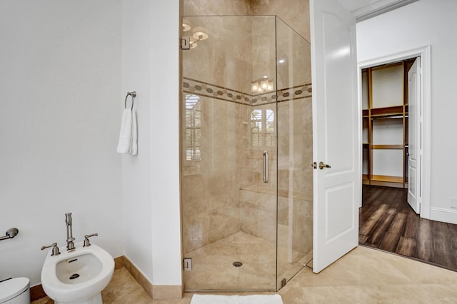 9210 Equus Cir, Boynton Beach, FL 33472 - bathroom featuring a bidet, a stall shower, and baseboards