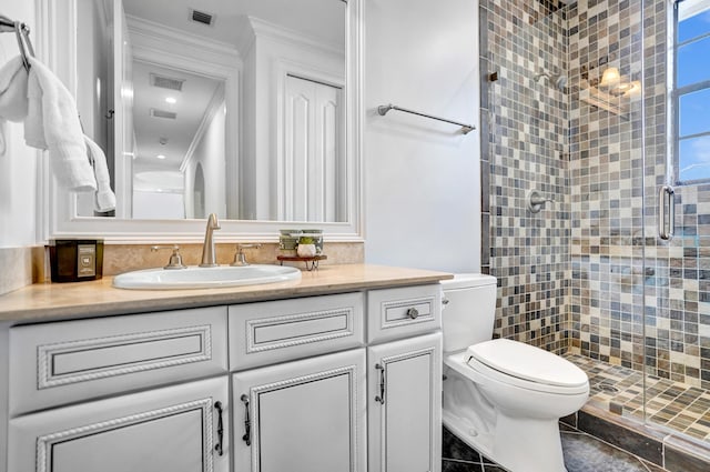 9210 Equus Cir, Boynton Beach, FL 33472 - full bathroom with a stall shower, vanity, toilet, and crown molding