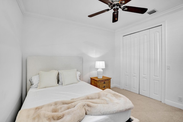 9210 Equus Cir, Boynton Beach, FL 33472 - bedroom with ornamental molding, a closet, carpet flooring, baseboards, and ceiling fan