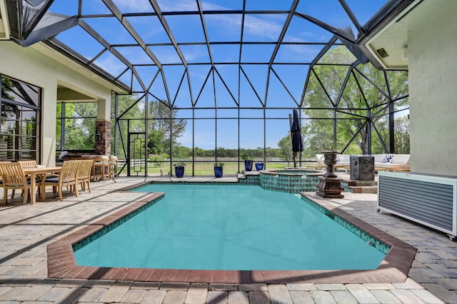 9210 Equus Cir, Boynton Beach, FL 33472 - view of pool with a patio, a lanai, a pool with connected hot tub, and outdoor dining space