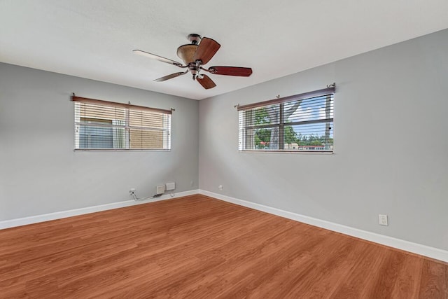 104 Lake Helen Dr, West Palm Beach, FL 33411 - empty room with light wood finished floors, baseboards, and ceiling fan