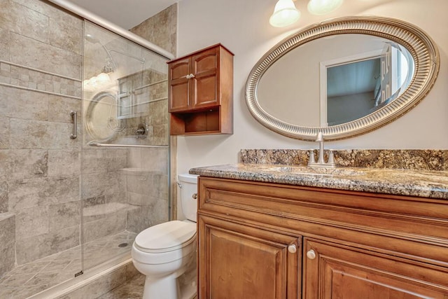 104 Lake Helen Dr, West Palm Beach, FL 33411 - bathroom with vanity, toilet, and a shower stall
