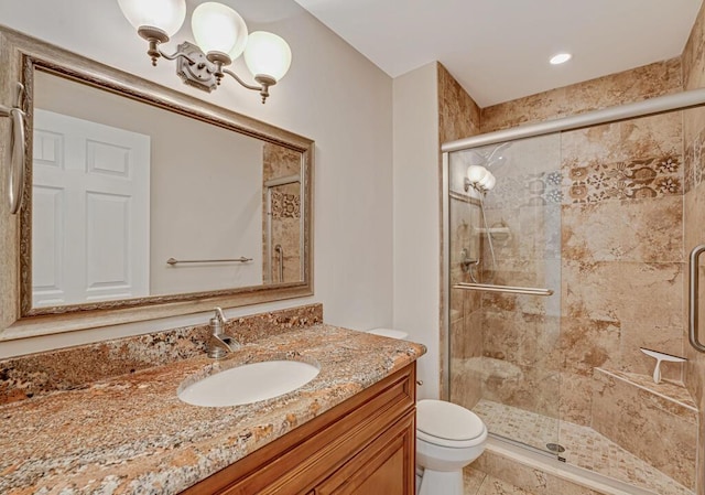 104 Lake Helen Dr, West Palm Beach, FL 33411 - bathroom with a stall shower, vanity, and toilet