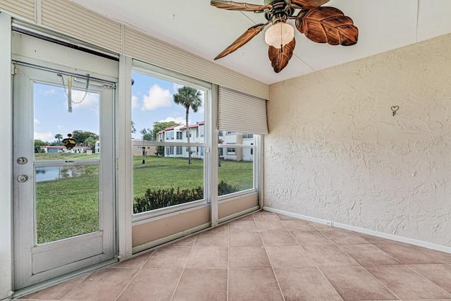 104 Lake Helen Dr, West Palm Beach, FL 33411 - unfurnished sunroom with a wealth of natural light