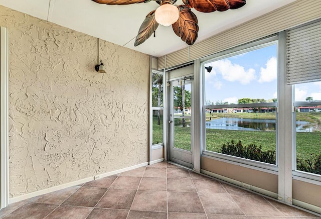 104 Lake Helen Dr, West Palm Beach, FL 33411 - unfurnished sunroom with a water view and ceiling fan
