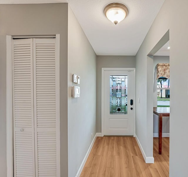 104 Lake Helen Dr, West Palm Beach, FL 33411 - entryway featuring light wood finished floors and baseboards