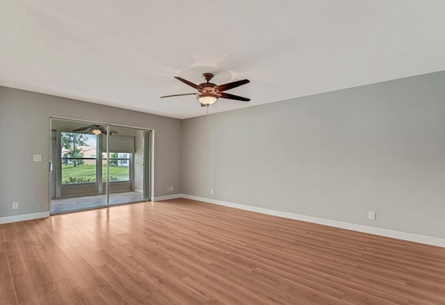104 Lake Helen Dr, West Palm Beach, FL 33411 - empty room with a ceiling fan, light wood-style floors, and baseboards