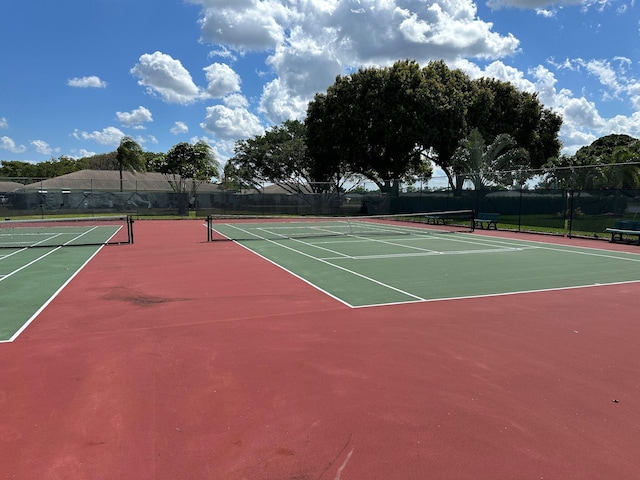 14280 Nesting Way Unit B, Delray Beach, FL 33484 - view of sport court featuring community basketball court and fence