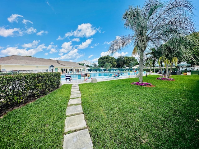 14280 Nesting Way Unit B, Delray Beach, FL 33484 - view of yard with fence and a community pool
