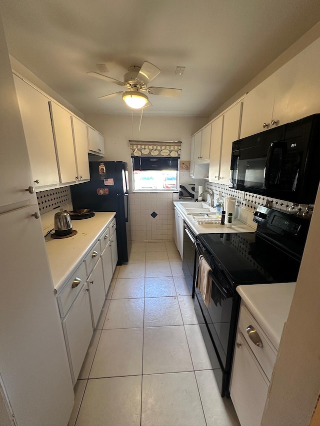 14280 Nesting Way Unit B, Delray Beach, FL 33484 - kitchen featuring light tile patterned flooring, black appliances, ceiling fan, light countertops, and white cabinets