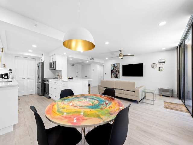 dining area featuring visible vents, recessed lighting, a ceiling fan, and light wood finished floors