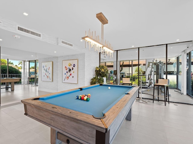 rec room featuring a wall of windows, billiards, visible vents, and a wealth of natural light