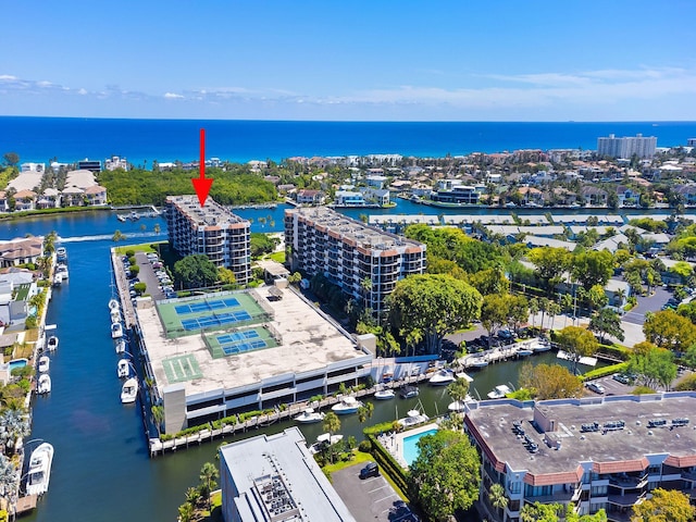birds eye view of property featuring a water view