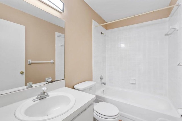 full bath with toilet, vanity, and  shower combination