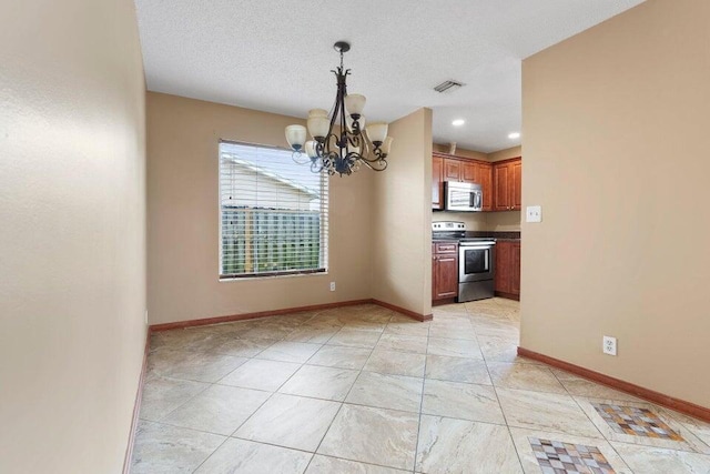 unfurnished dining area featuring a notable chandelier, a textured ceiling, baseboards, visible vents, and recessed lighting