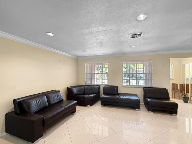 6875 NW 1st Ct, Margate, FL 33063 - living area with crown molding, light tile patterned floors, visible vents, and a textured ceiling