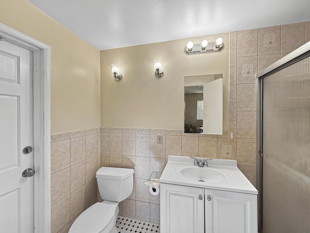 6875 NW 1st Ct, Margate, FL 33063 - bathroom featuring toilet, vanity, and tile walls