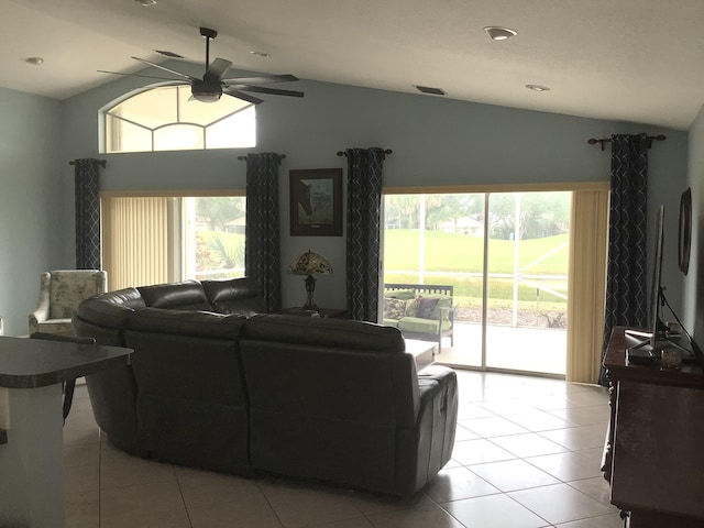 7007 Ashton St, Boynton Beach, FL 33437 - living room with light tile patterned floors, a ceiling fan, plenty of natural light, and lofted ceiling