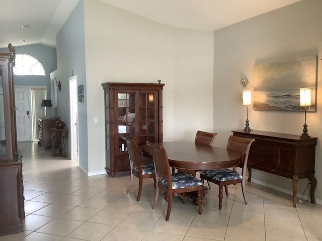 7007 Ashton St, Boynton Beach, FL 33437 - dining area with baseboards, high vaulted ceiling, and light tile patterned flooring