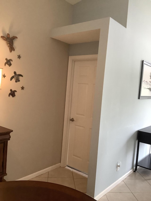 7007 Ashton St, Boynton Beach, FL 33437 - hall with light tile patterned floors and baseboards