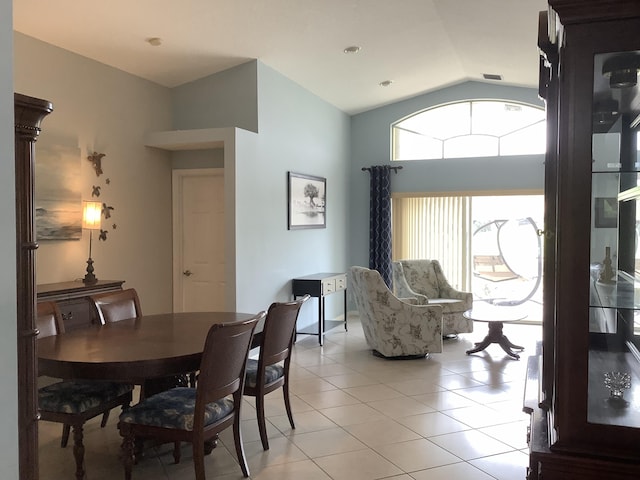 7007 Ashton St, Boynton Beach, FL 33437 - dining room featuring light tile patterned floors and vaulted ceiling