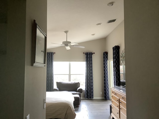 7007 Ashton St, Boynton Beach, FL 33437 - bedroom with a ceiling fan, visible vents, vaulted ceiling, wood finished floors, and baseboards
