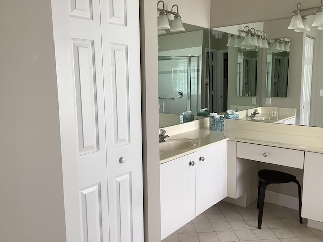 7007 Ashton St, Boynton Beach, FL 33437 - bathroom with a closet, tile patterned floors, a stall shower, and vanity