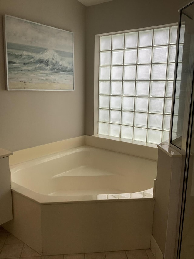 7007 Ashton St, Boynton Beach, FL 33437 - bathroom with a shower with shower door, tile patterned flooring, and a garden tub