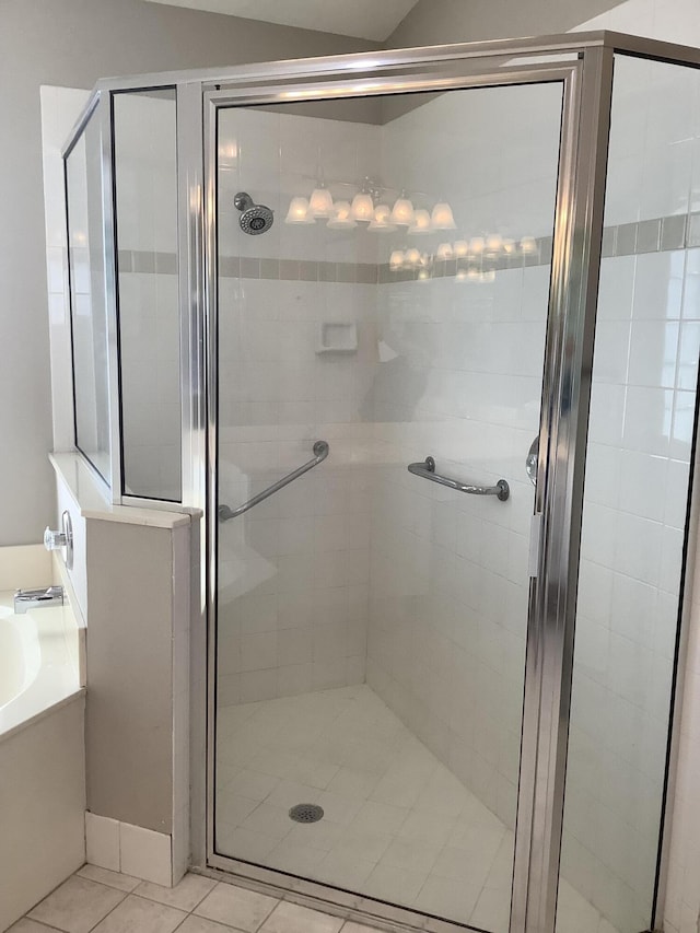 7007 Ashton St, Boynton Beach, FL 33437 - bathroom featuring a bath, a stall shower, and tile patterned floors