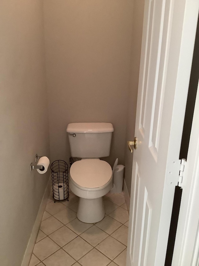 7007 Ashton St, Boynton Beach, FL 33437 - bathroom with toilet, baseboards, and tile patterned flooring
